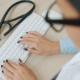 Professional healthcare administration office workspace representing behavioral health documentation and compliance