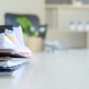 Stack of paper files and pen business equipment on office table.
