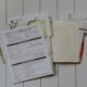 stack of papers flat lay photography