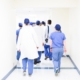Clinical team walking a facility corridor during a Joint Commission standards survey